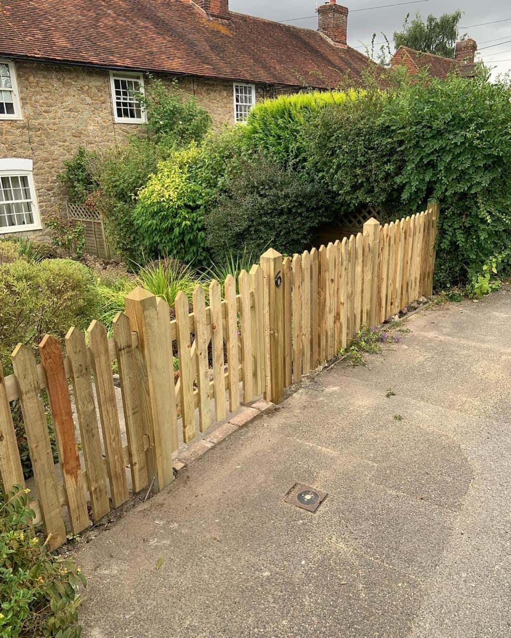 This is a photo of a picket fence and picket gate installed by Fxast Fix Fencing Paddock Wood