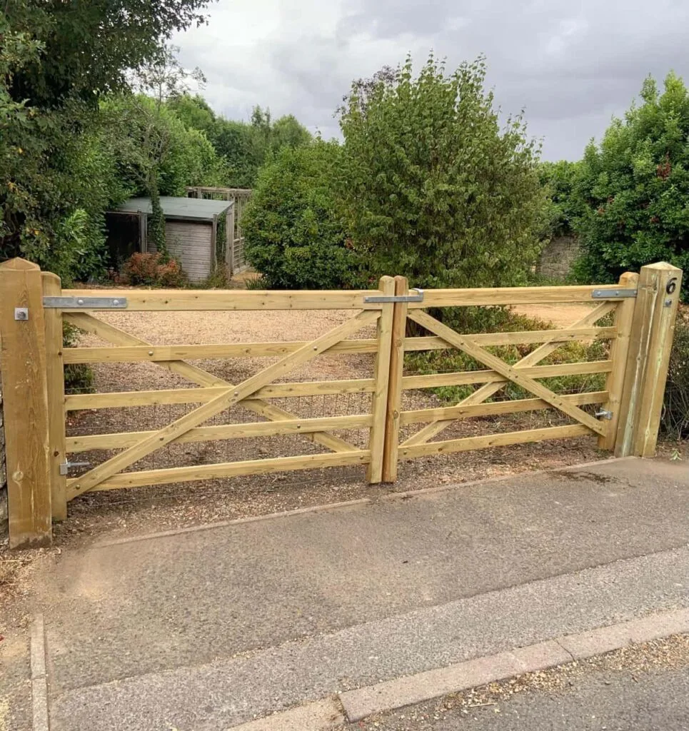 This is a photo of a wooden driveway gate installed by Fast Fix Fencing Paddock Wood